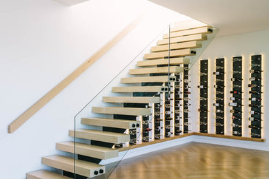 Photo of a contemporary wine cellar in Los Angeles.