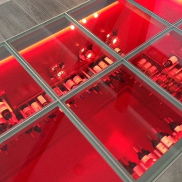 Glass Floor Penthouse Luxury Wine Cellar with STACT Wine Wall System