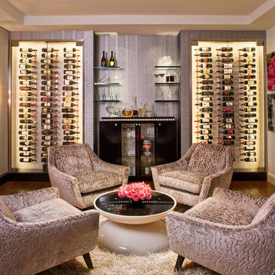 Large trendy dark wood floor and brown floor wine cellar photo in Los Angeles with storage racks