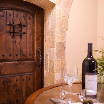 Iron-Accented Door in Wine Cellar