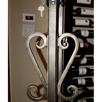 Iron Handles for Wine Cellar Door Texas Master Builders