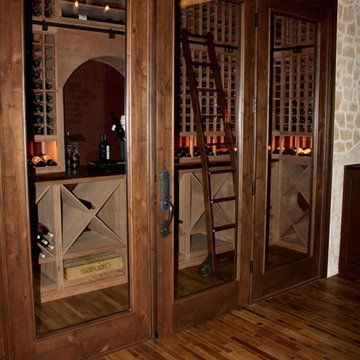 Knotty Alder and Glass Custom Wine Cellar Door in Texas