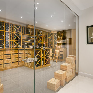 Large private wine cellar in Wimbledon, London using solid Oak racking