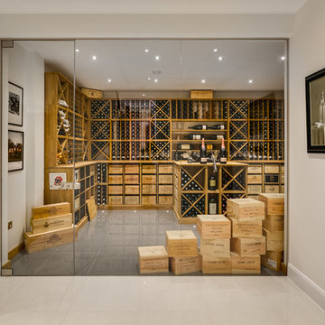 Large private wine room in Wimbledon, London using solid Oak racking