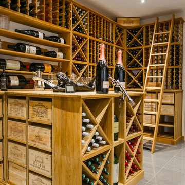Large private wine room in Wimbledon, London using solid Oak racking