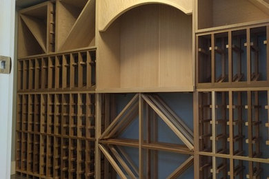 Inspiration for a contemporary wine cellar remodel in Calgary