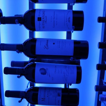 Metal Wine Rack Shows How it Displays Vintage Wine Bottles Excellently