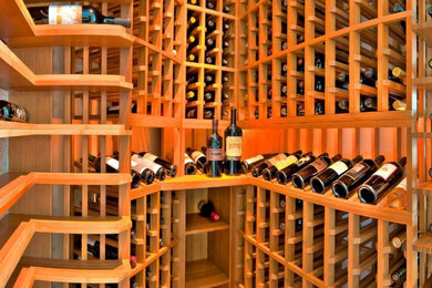 Example of a classic wine cellar design in Milwaukee