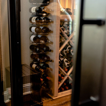 Modern Glass Wine Cellar Door and Elegant Wine Racks