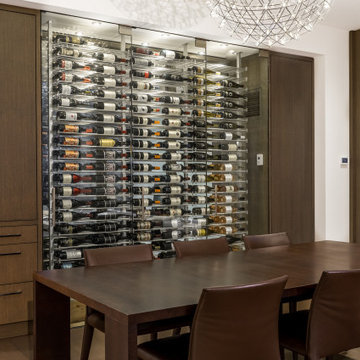 Modern Wine Cellar With Sleek Racking, Enclosed In Glass