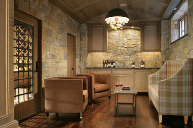 Example of a classic dark wood floor and brown floor wine cellar design in New York