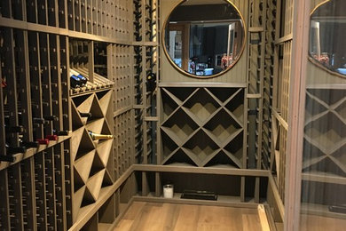 Example of a small wine cellar design in Salt Lake City with storage racks