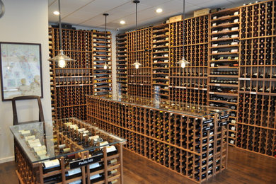 Inspiration for a large contemporary wine cellar remodel in Portland with display racks