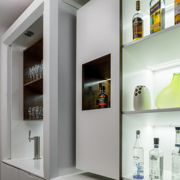 Partywall// White Lacquer Cabinetry and Storage with Integral LED Lighting