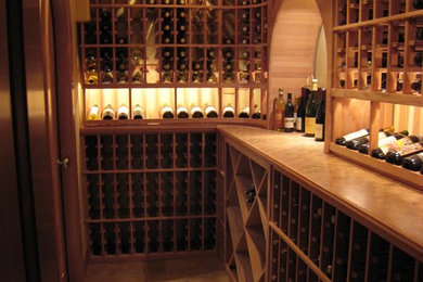 Inspiration for a rustic bamboo floor wine cellar remodel in San Francisco