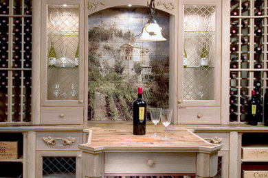 Inspiration for a mid-sized timeless wine cellar remodel in New York with diamond bins