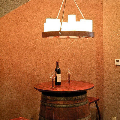 Tuscan terra-cotta tile wine cellar photo in Denver