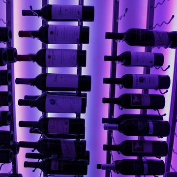 Purple LED lit Metal Wine Racks and Vintage Wine Bottles