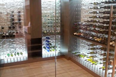 This is an example of a contemporary wine cellar in Toronto.