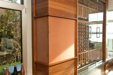 Inspiration for a contemporary wine cellar remodel in Montreal