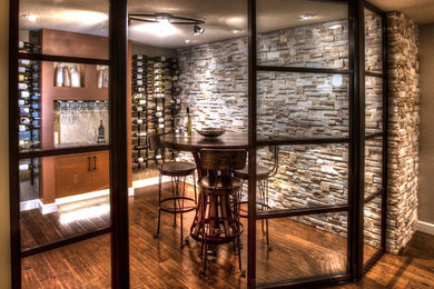 Photo of a contemporary wine cellar in Other.