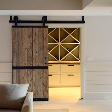 Rustic wood barn door to wine cellar