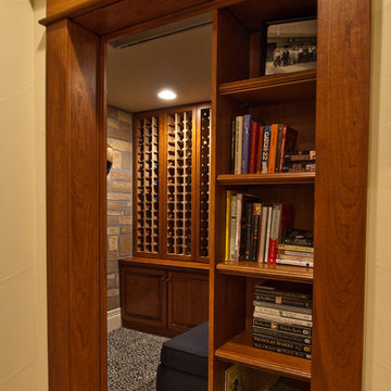 Secret access through sliding bookcase to wine cellar!