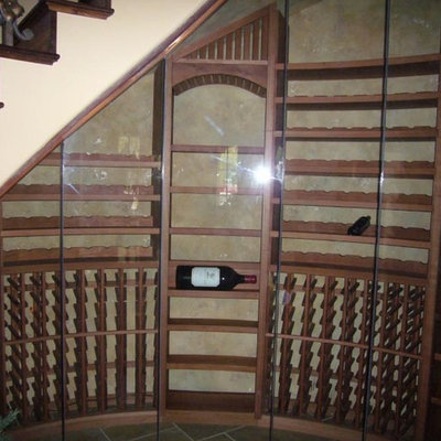 Inspiration for a large craftsman wine cellar remodel in Sacramento with storage racks