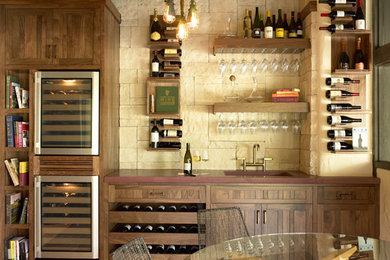 Medium sized modern wine cellar in San Francisco with terracotta flooring.