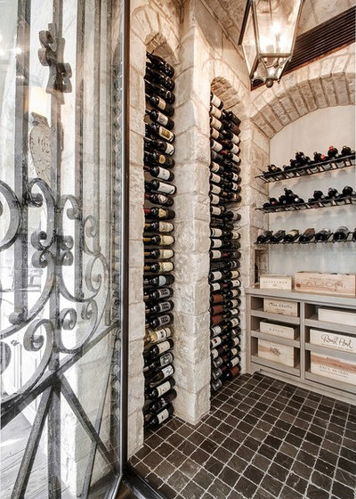 Mediterranean Wine Cellar by Allan Edwards Builder Inc.