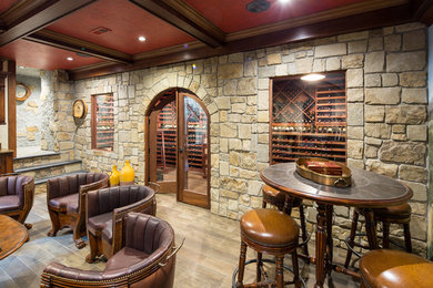 Wine cellar - large traditional porcelain tile and brown floor wine cellar idea in New York with diamond bins