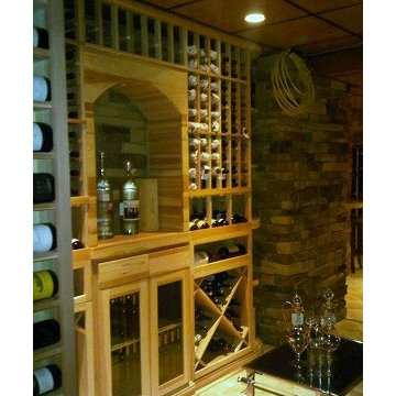 The Natural Stone and Wine Racking in this Wine Cellar Design NJ Complement Each