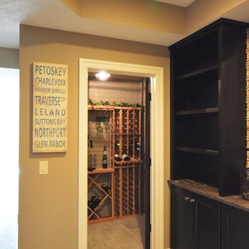 The wet bar leads to the wine cellar