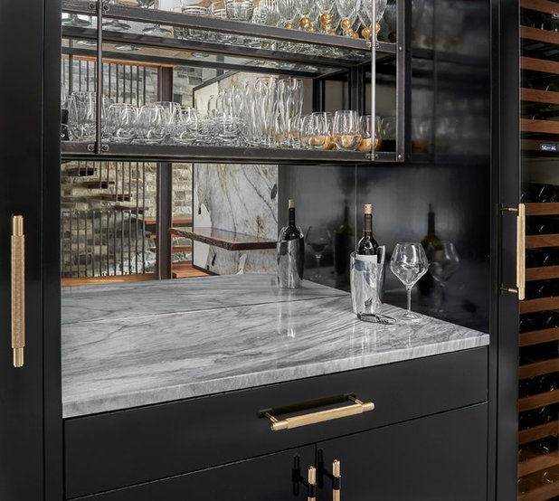 Transitional Wine Cellar by Charles Vincent George Architects, Inc.