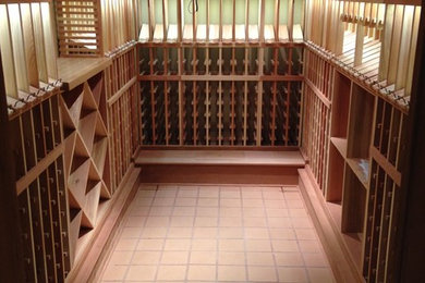 Inspiration for a small wine cellar remodel in Salt Lake City with storage racks