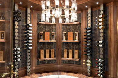 Wine cellar - traditional wine cellar idea in Vancouver with storage racks