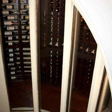 Windows to view Under the Stairs of a Home Wine Cellar