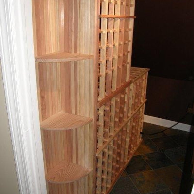 Large arts and crafts wine cellar photo in Minneapolis with storage racks
