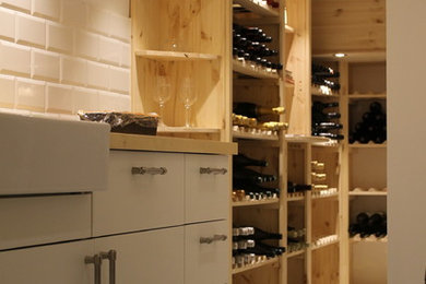 Inspiration for a contemporary wine cellar remodel in Amsterdam