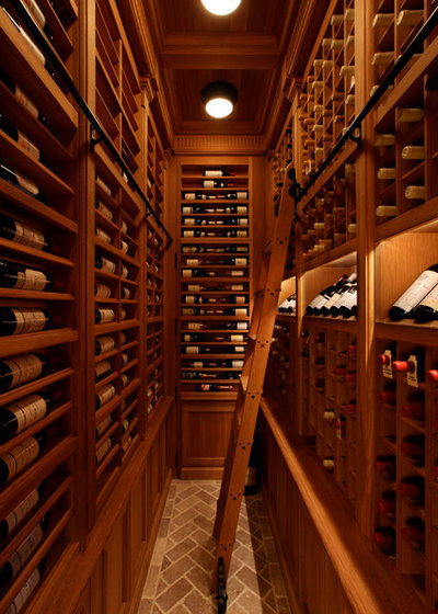 Traditional Wine Cellar by LINDA LONDON LTD.