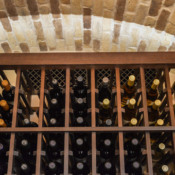 Wine Cellar Tuscan Design used LED Uplighting on the Brick Barrel Ceiling in the