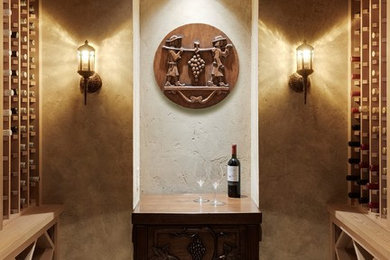 Inspiration for a mediterranean wine cellar remodel in Minneapolis