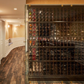 Wine Cellar with Glass Walls in Lower Level Basement