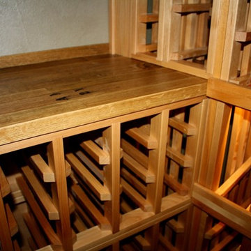 Wine Cellar with Reclaimed Wine Barrel Tabletop and Efficient Cooling Unit