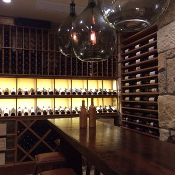 Wine Enthusiast Custom Cellar Built Into Stone; All Heart Redwood w/ Light Stain
