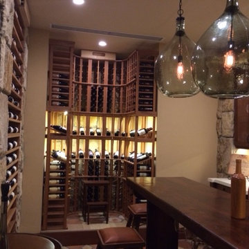 Wine Enthusiast Custom Cellar Built Into Stone; All Heart Redwood w/ Light Stain