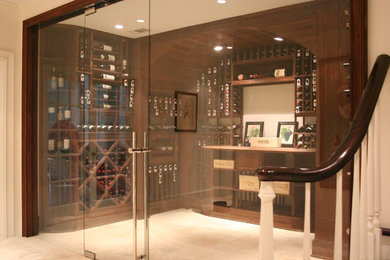 Large trendy travertine floor and beige floor wine cellar photo in Atlanta with display racks