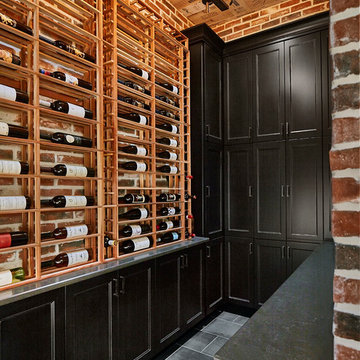 Wine room with reused wine racks and new custom cabinets