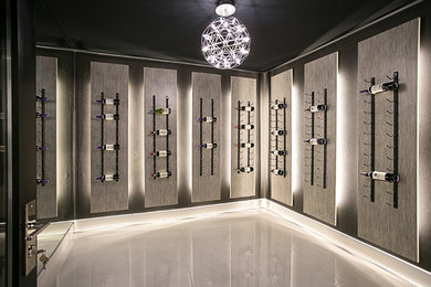 Inspiration for a wine cellar remodel in Toronto with display racks