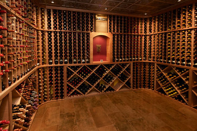 Example of a mid-sized classic porcelain tile wine cellar design in Sacramento with diamond bins